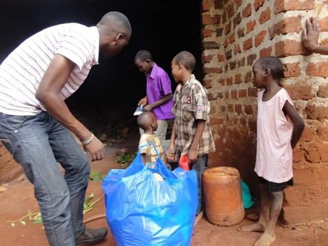 BUYING FOOD AND CLOTHING TO RURAL FAMILIES.